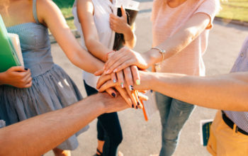 Teenagers Young Team Students Together Stacked Hands Close Up